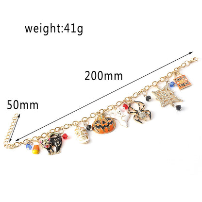 Bracelet with Halloween-themed charms and measurements on a white background