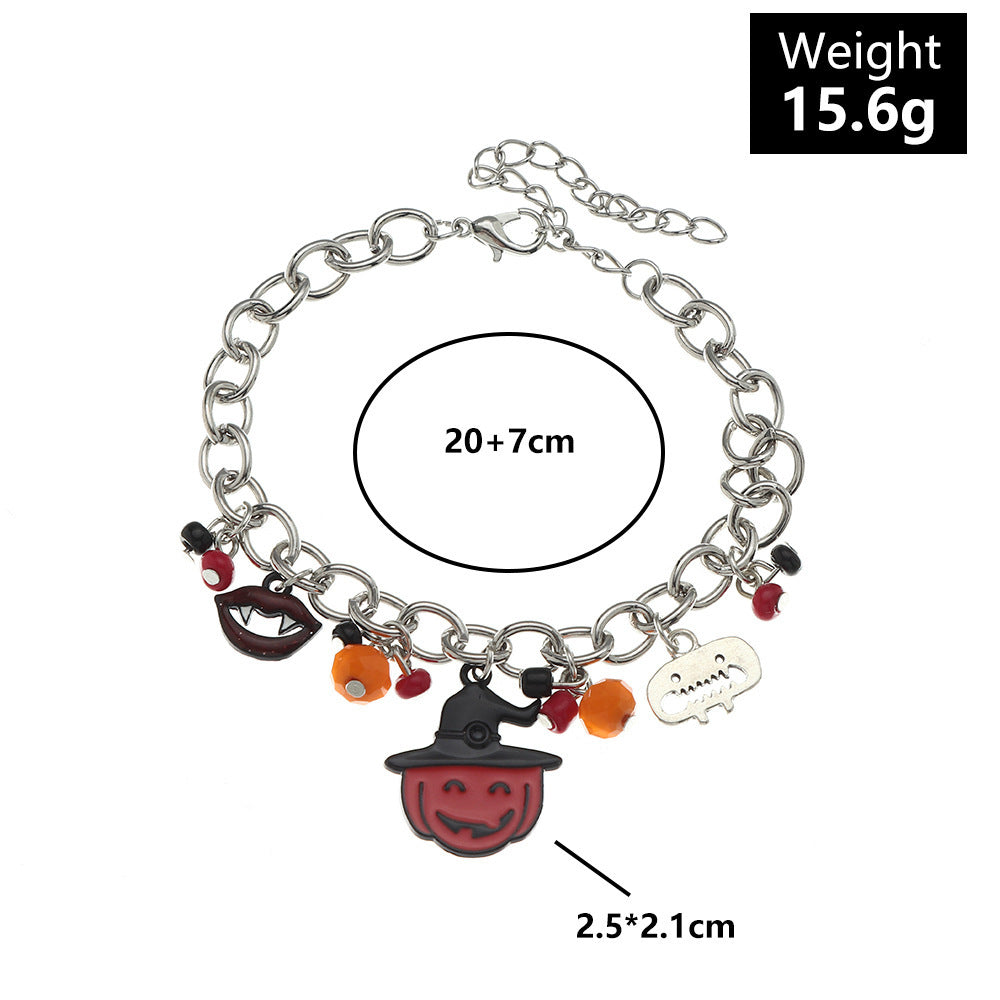 Bracelet with Halloween-themed charms on a white background