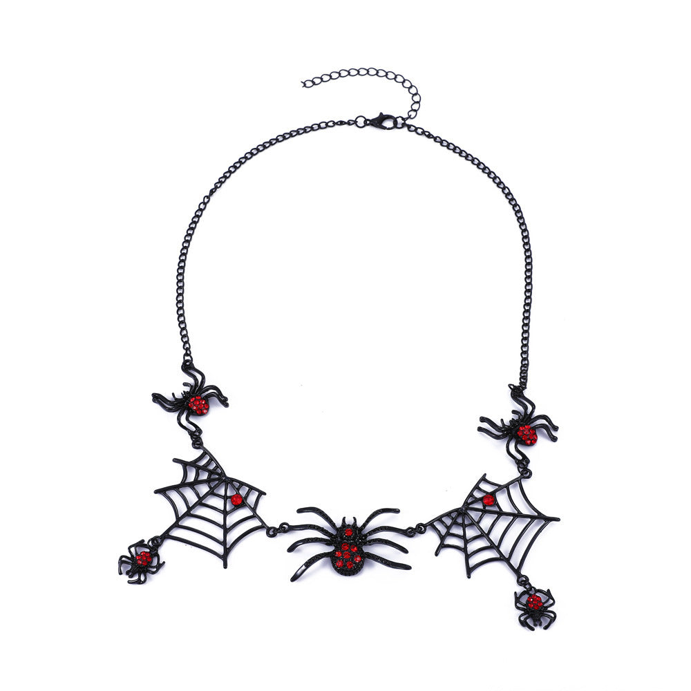 Necklace with spider and web designs on a white background