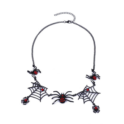 Necklace with spider and web designs on a white background