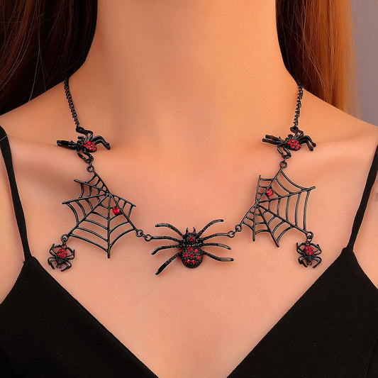 Spooky spider and web necklace on a mannequin with a black top.