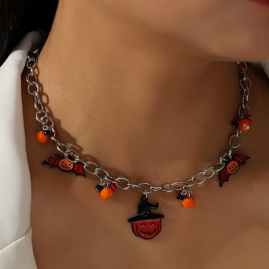 Necklace with Halloween-themed charms on a person's neck