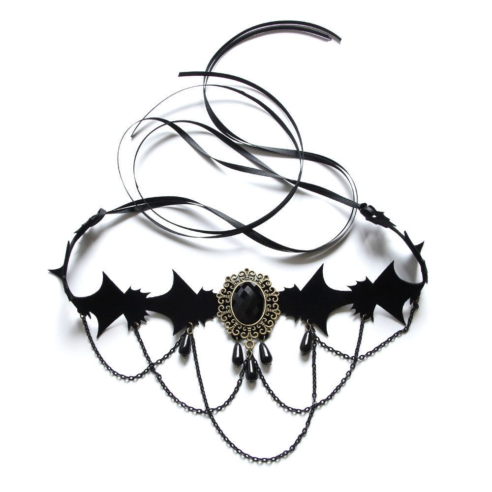 Black choker necklace with bat designs and a central pendant on a white background