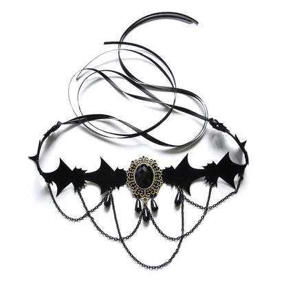 Black choker necklace with bat designs and a central pendant on a white background