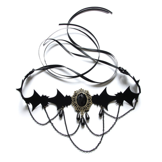 Black choker necklace with bat designs and a central pendant on a white background