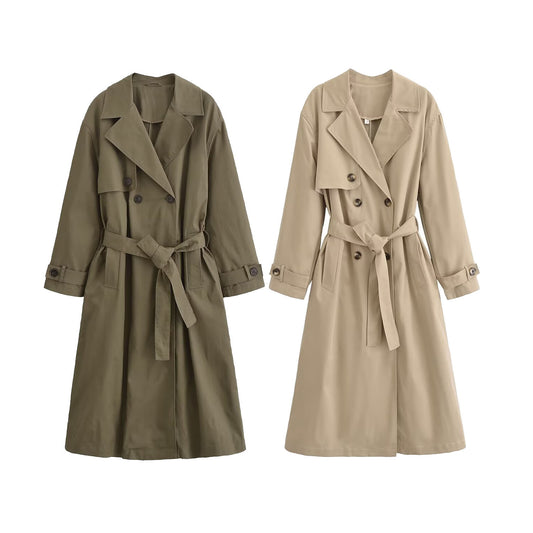 Two trench coats, one green and one beige, on a white background