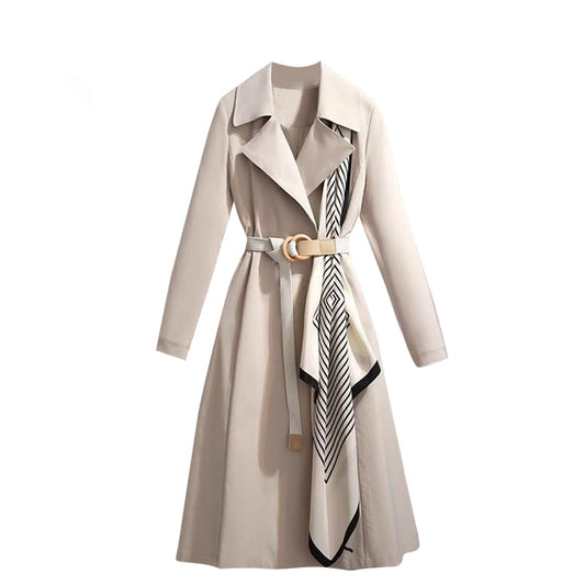 Beige trench coat with a patterned scarf and belt on a white background